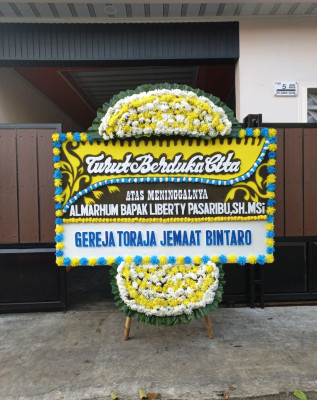 Papan Bunga Duka di Singgahan